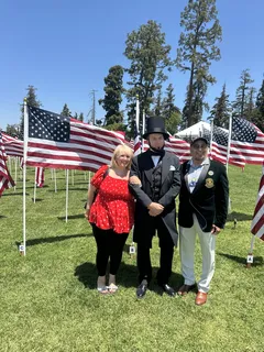 Melina Sardar with an honor guard at the Field of Honor