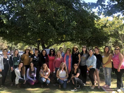 Melina Sardar with a large group of students